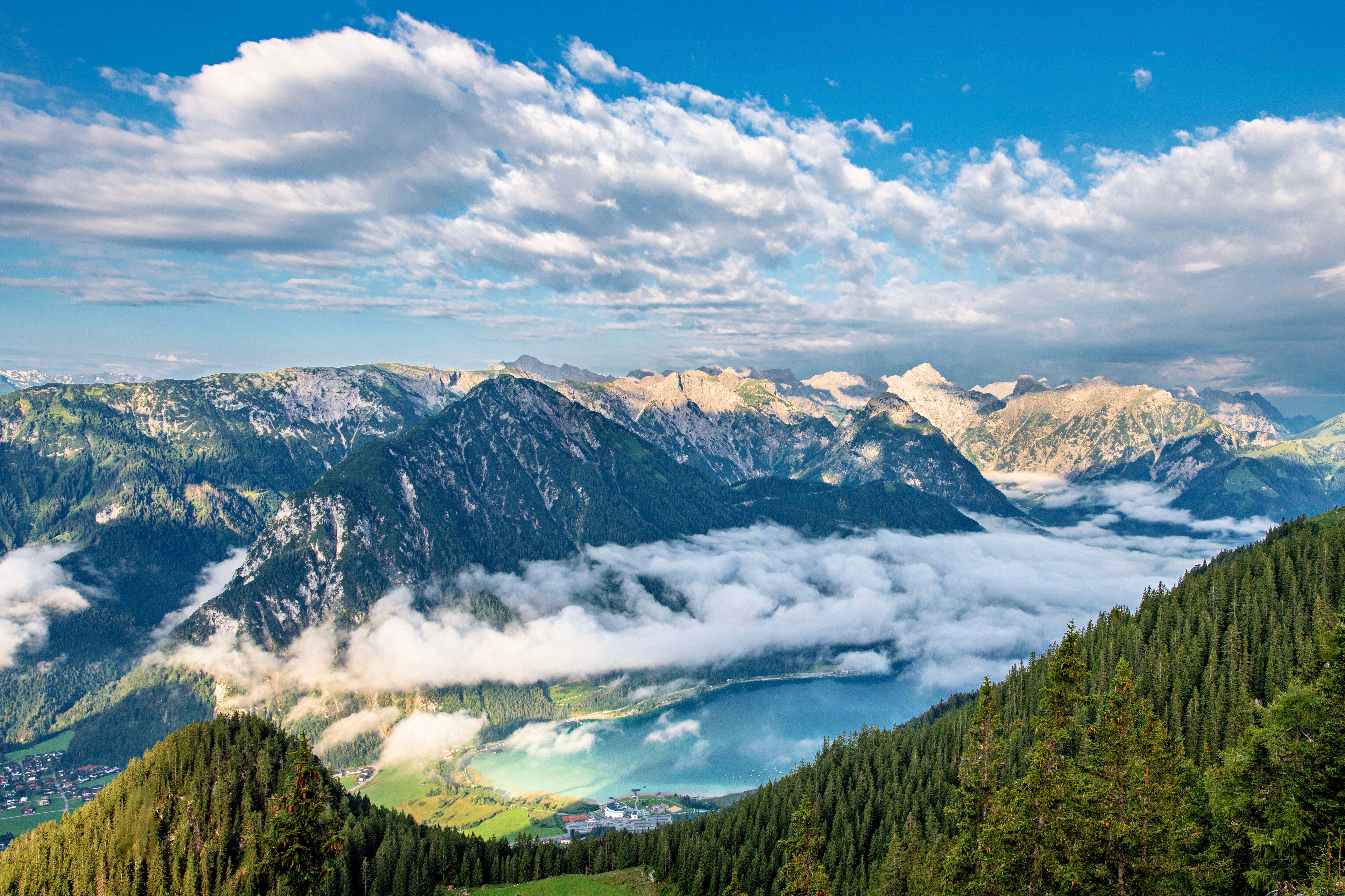 Spectacular Alpine Mountains Above the Clouds · Free Stock Photo