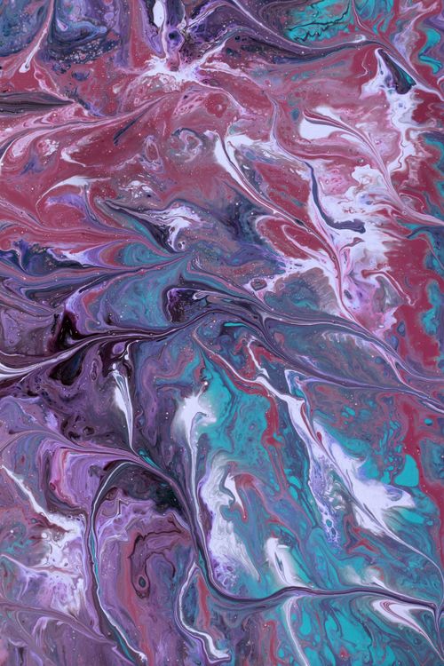 Free Vibrant fluid art painting with swirling colors of turquoise, pink, and purple. Stock Photo