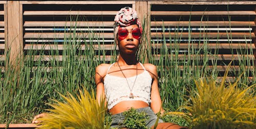 Photo Of Woman Wearing Red Sunglasses