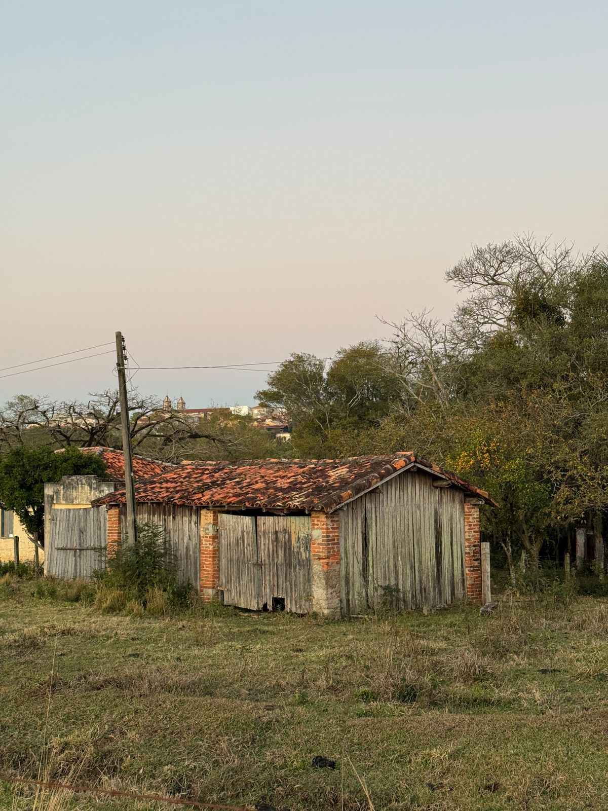 Wooden outbuilding in a rural setting