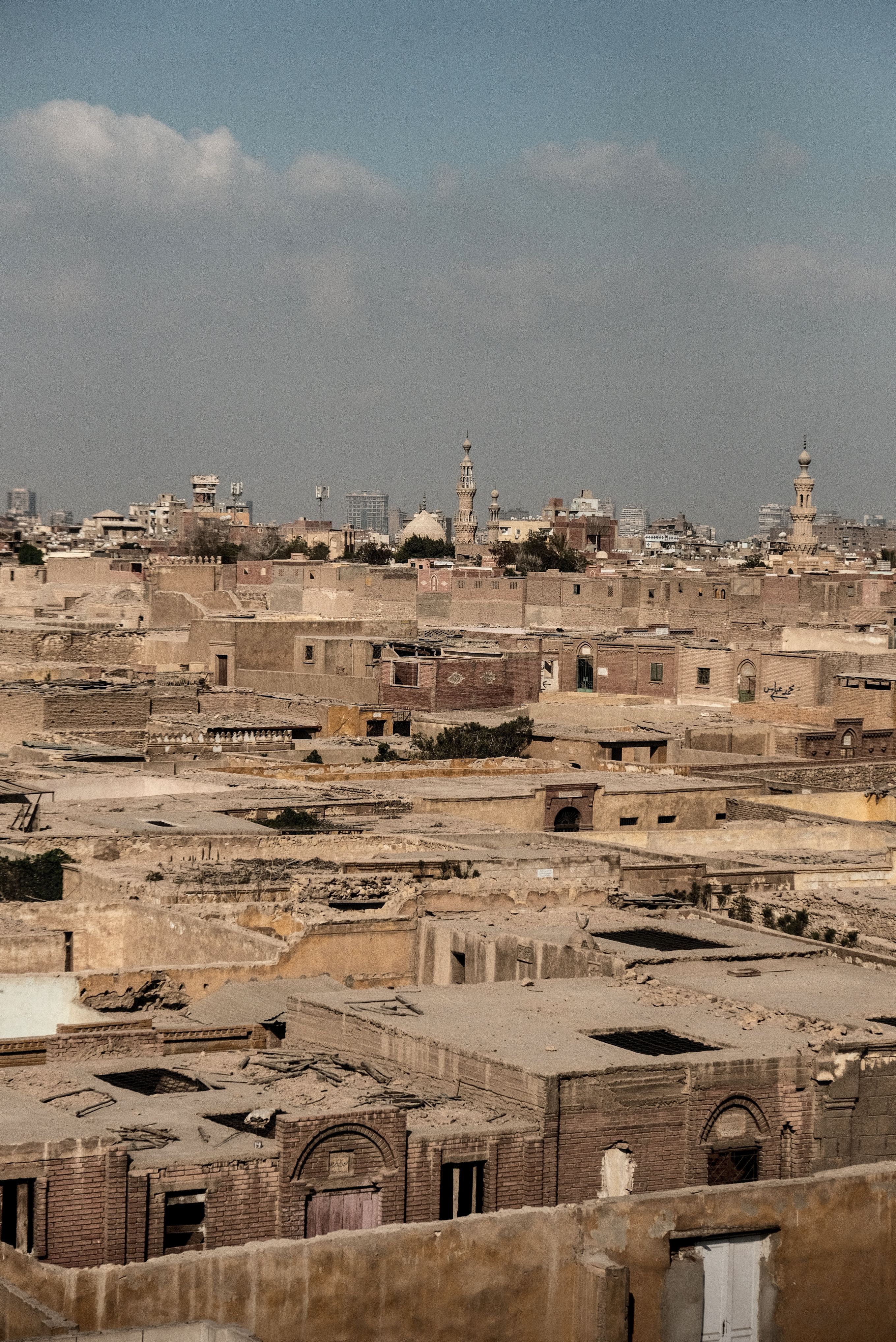 Discover the timeless rooftops of Cairo, showcasing Islamic minarets and historic architecture.