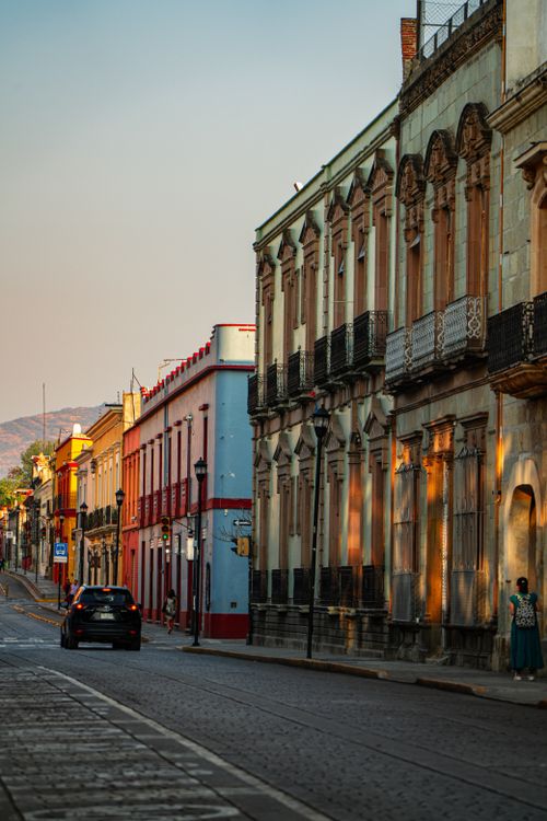 Colonial street in Oaxaca at first light — photo by Alex Revilla on Pexels