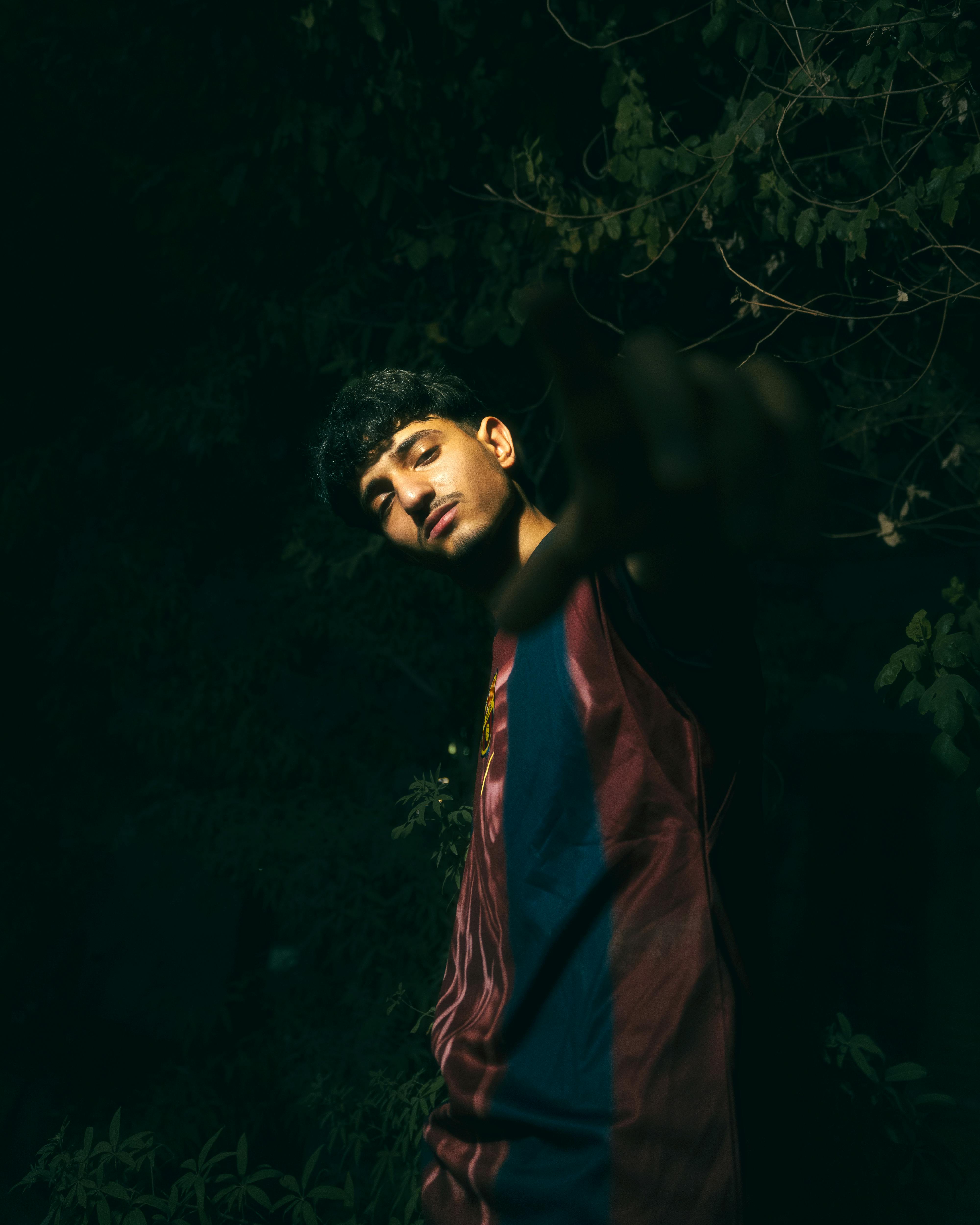 moody portrait of a man at night