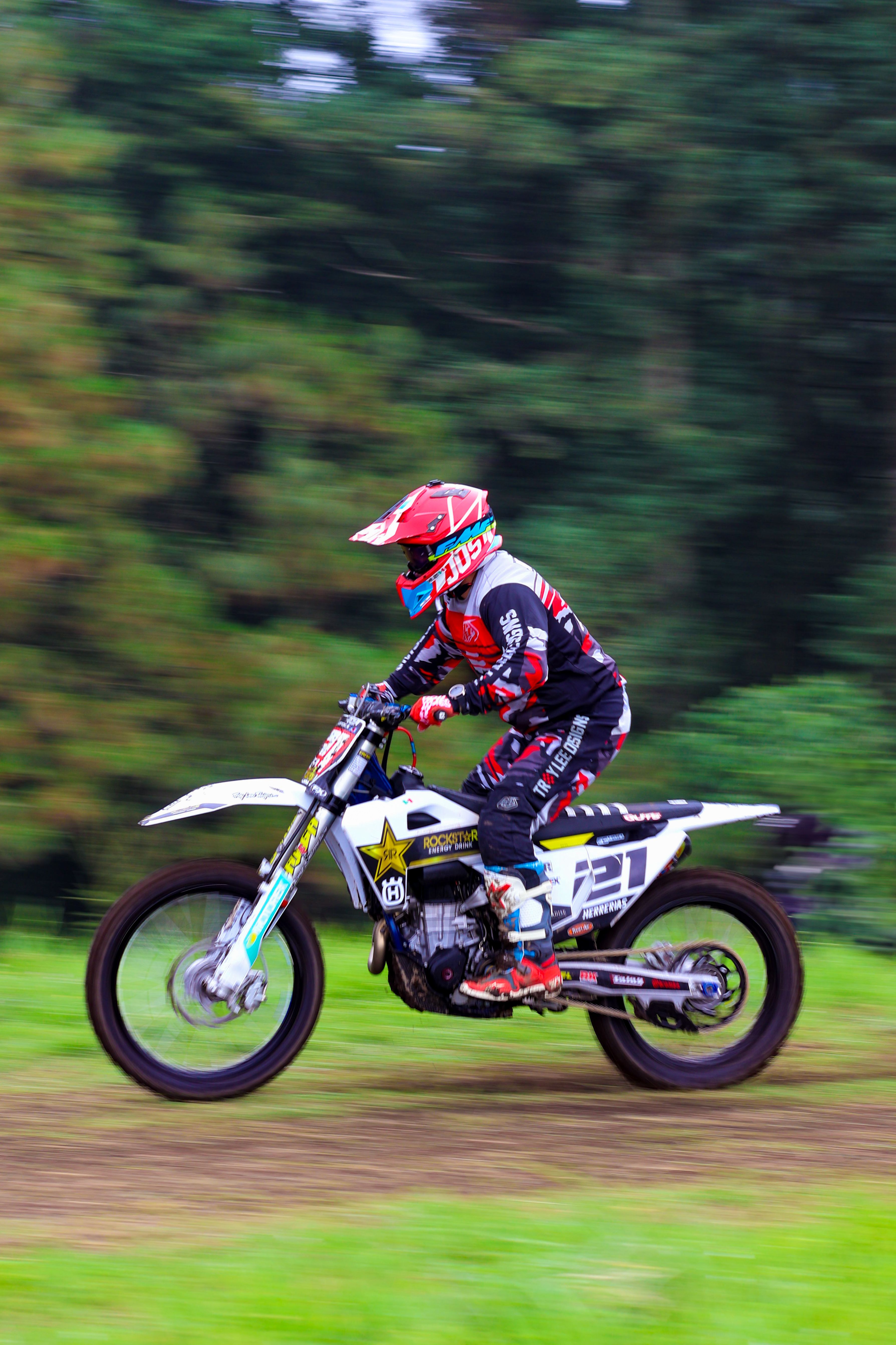 Dynamic Motocross Rider Racing Outdoors · Free Stock Photo