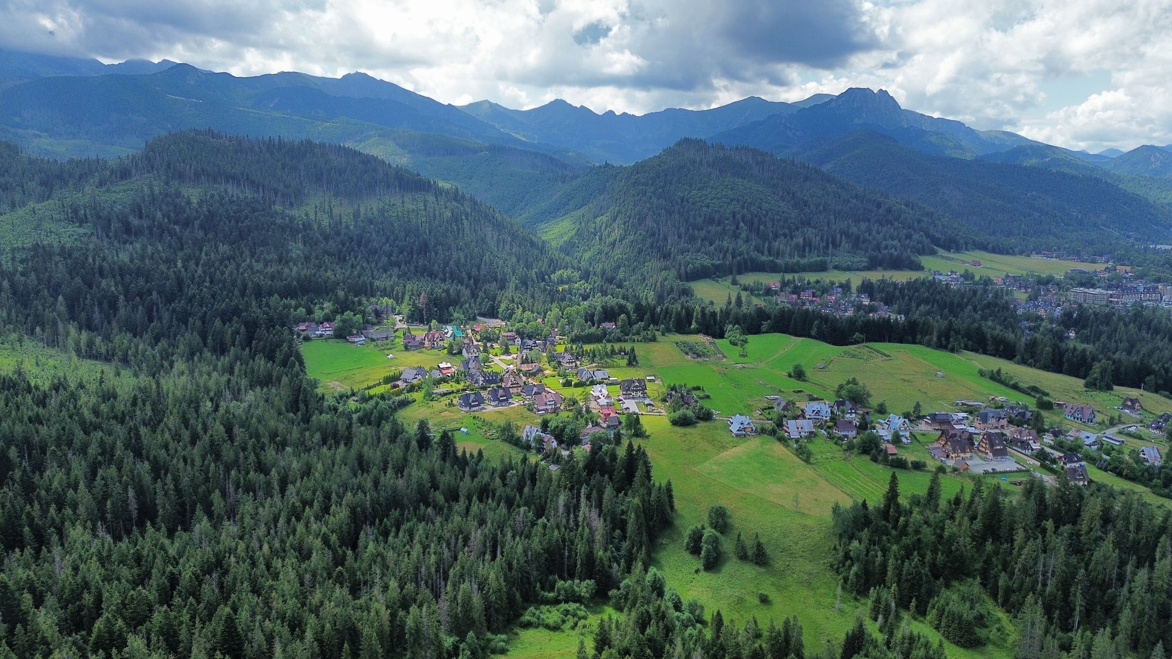 Breathtaking aerial photo of a picturesque valley in the Tatra Mountains, Poland, during summer.