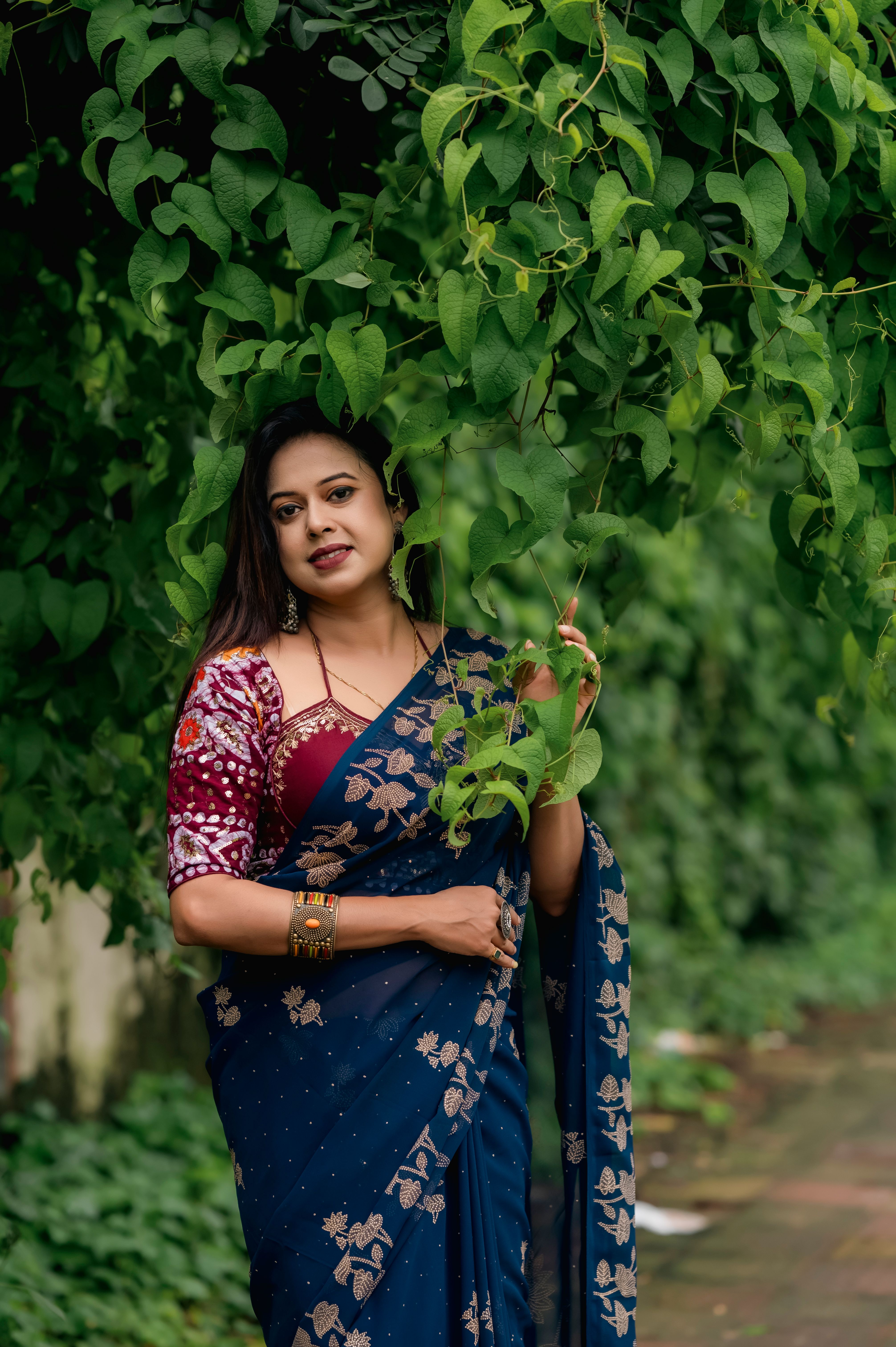 Elegant Woman Posing in Blue Sari Outdoors · Free Stock Photo