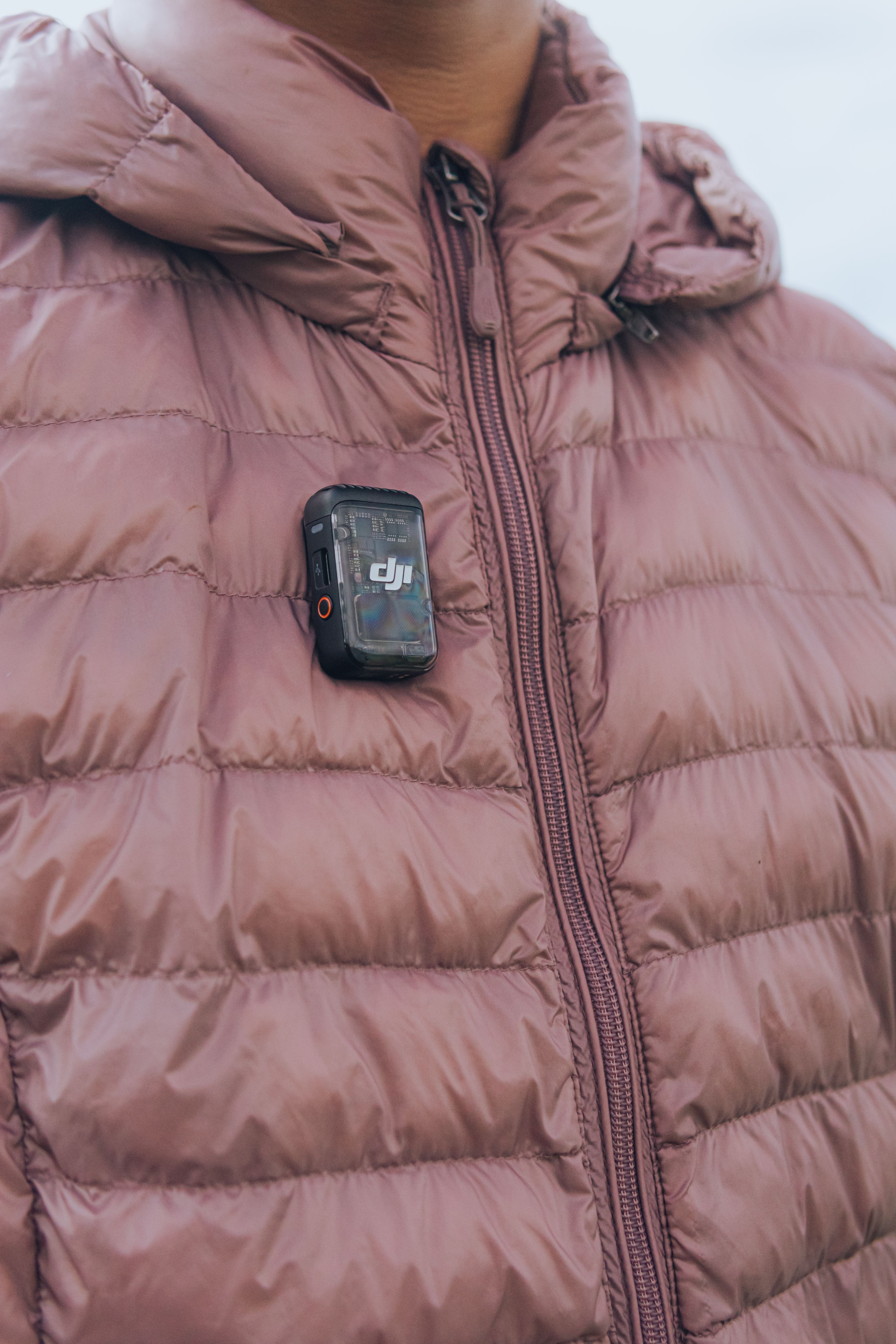 Close-Up of Puffer Jacket with Action Camera Attached · Free Stock Photo