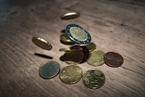 Close-up of Coins on Table