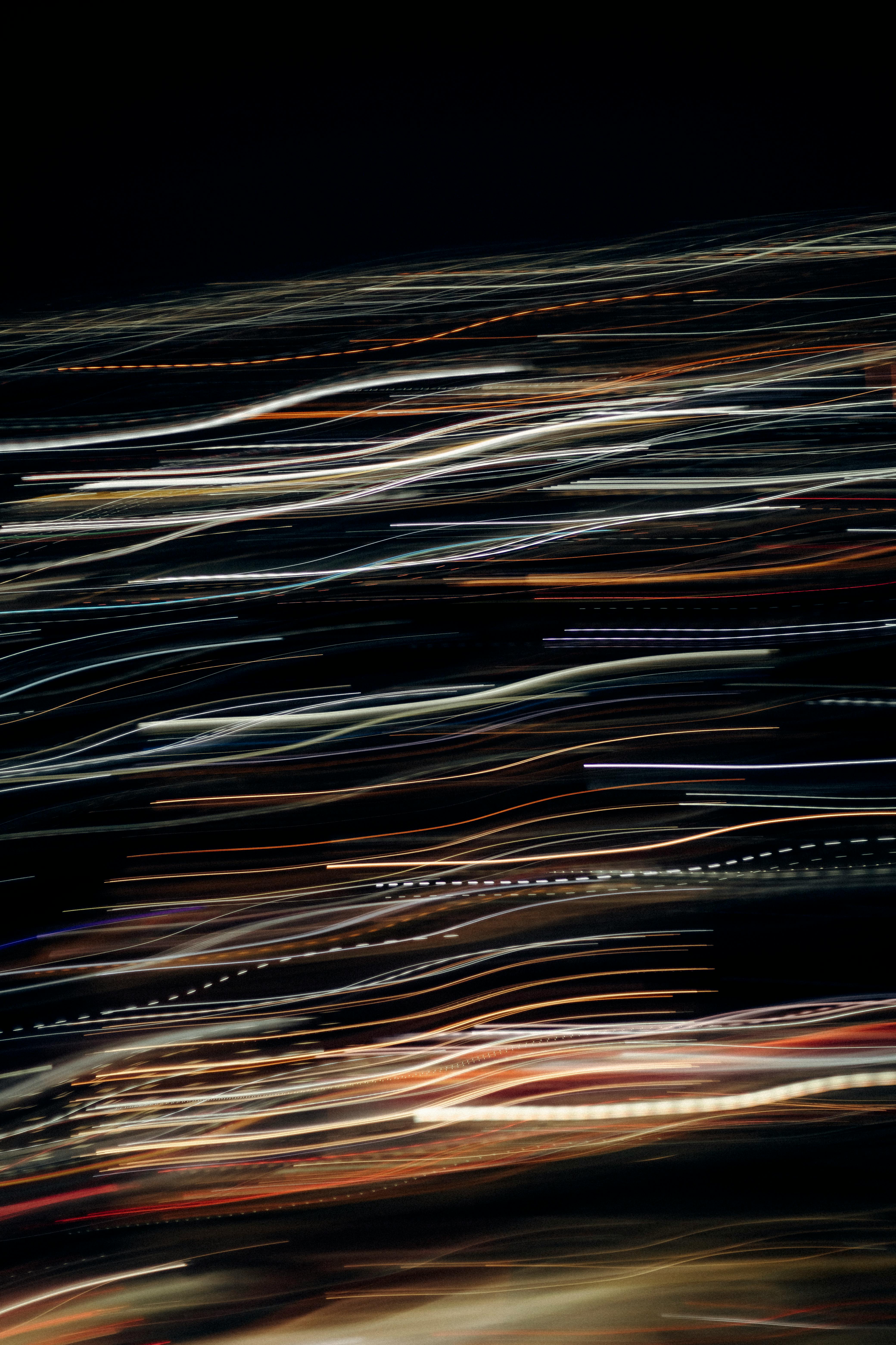 Dynamic abstract lines created by long exposure light trails at night.