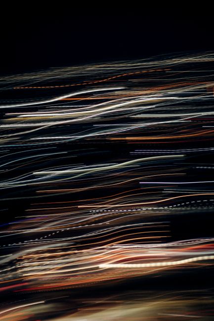 Dynamic abstract lines created by long exposure light trails at night.