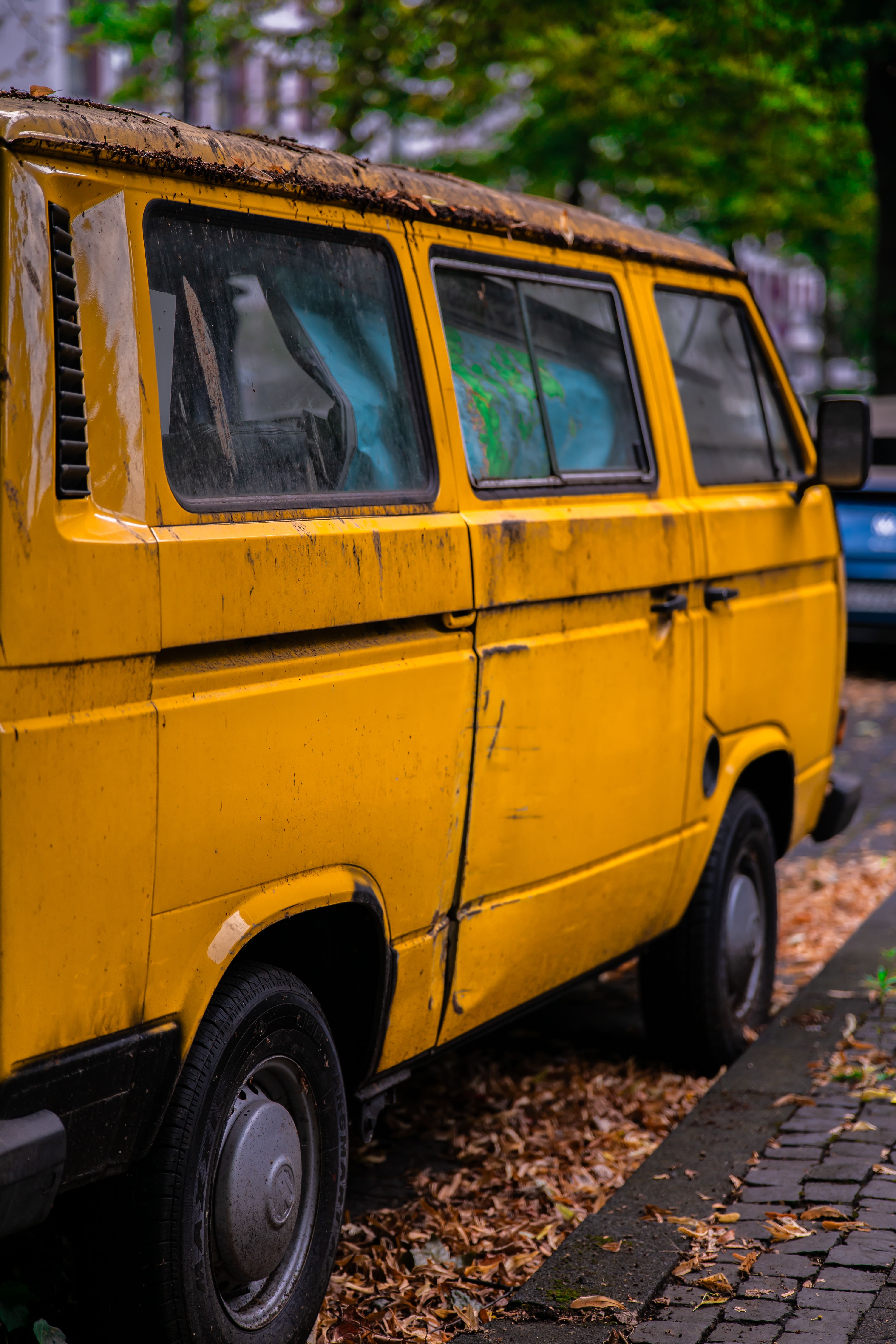 Vintage Yellow Volkswagen Van Parked Outdoors · Free Stock Photo