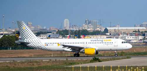 Free Vueling Airbus A320 with yellow engines at Manises Airport, Valencia. Stock Photo