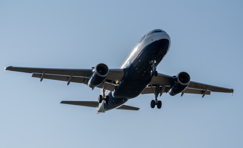 Free A British Airways Airbus A320 airplane landing at Manises Airport under clear skies. Stock Photo