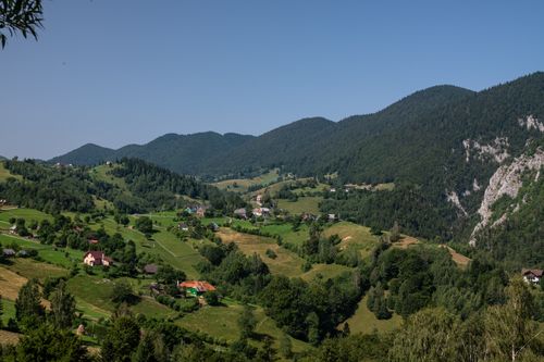 Free Explore the picturesque landscapes of Măgura village with lush hills and charming houses. Stock Photo