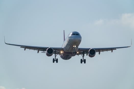 A commercial airplane approaches for landing at Manises Airport in Valencia, Spain.