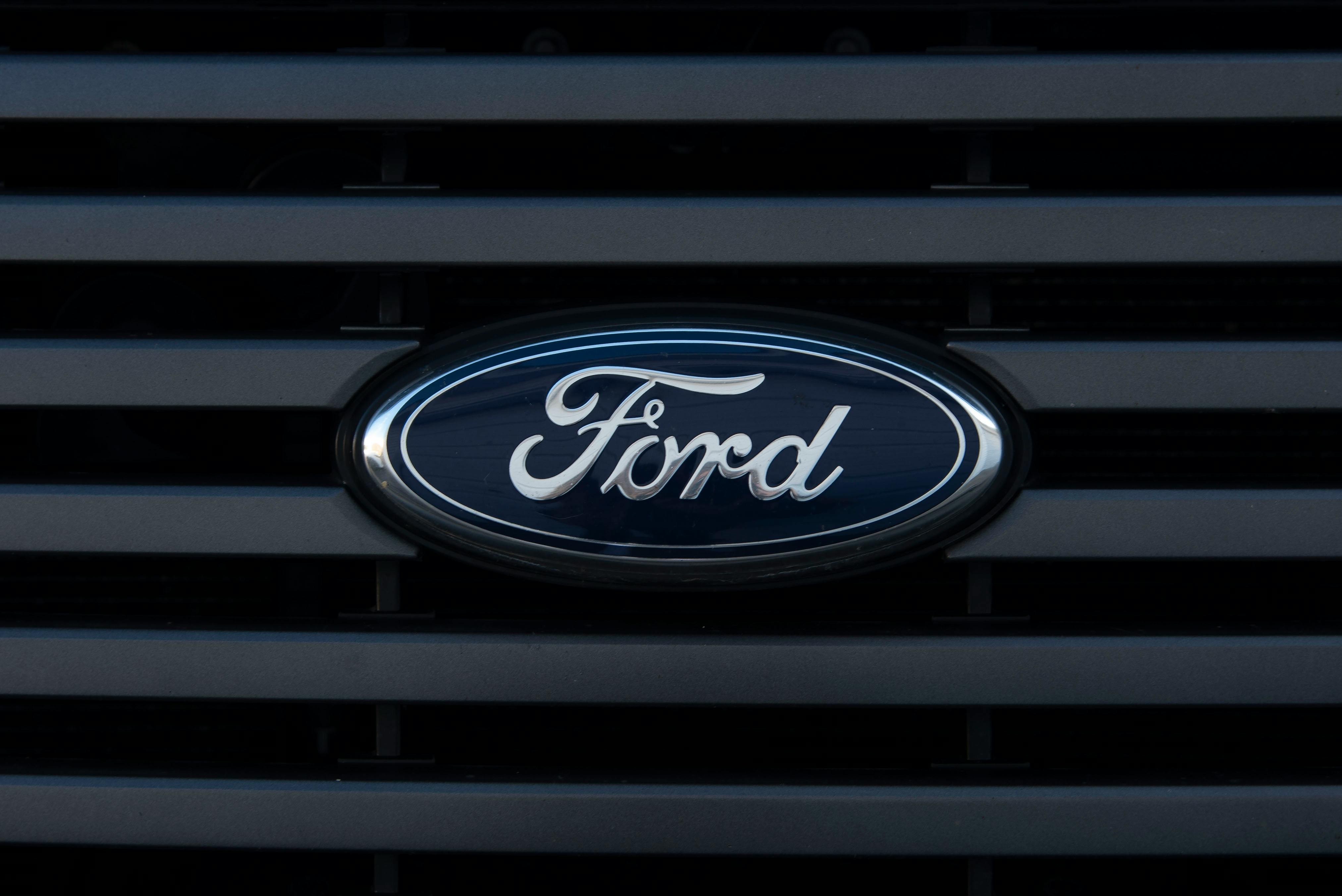 Black and Silver Ford Logo · Free Stock Photo