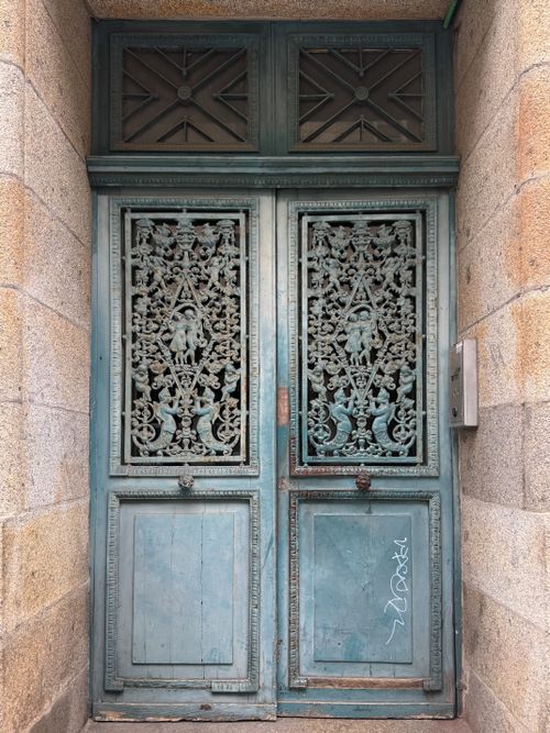 Free Intricate blue metal gate at a building entrance in Rennes, Brittany, France. Stock Photo