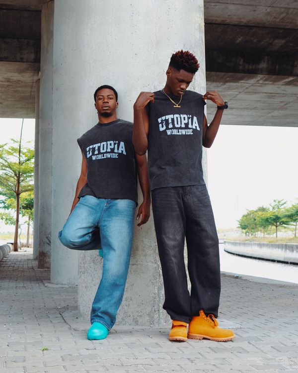 Two men in oversized streetwear graphic tees — urban fashion 2026