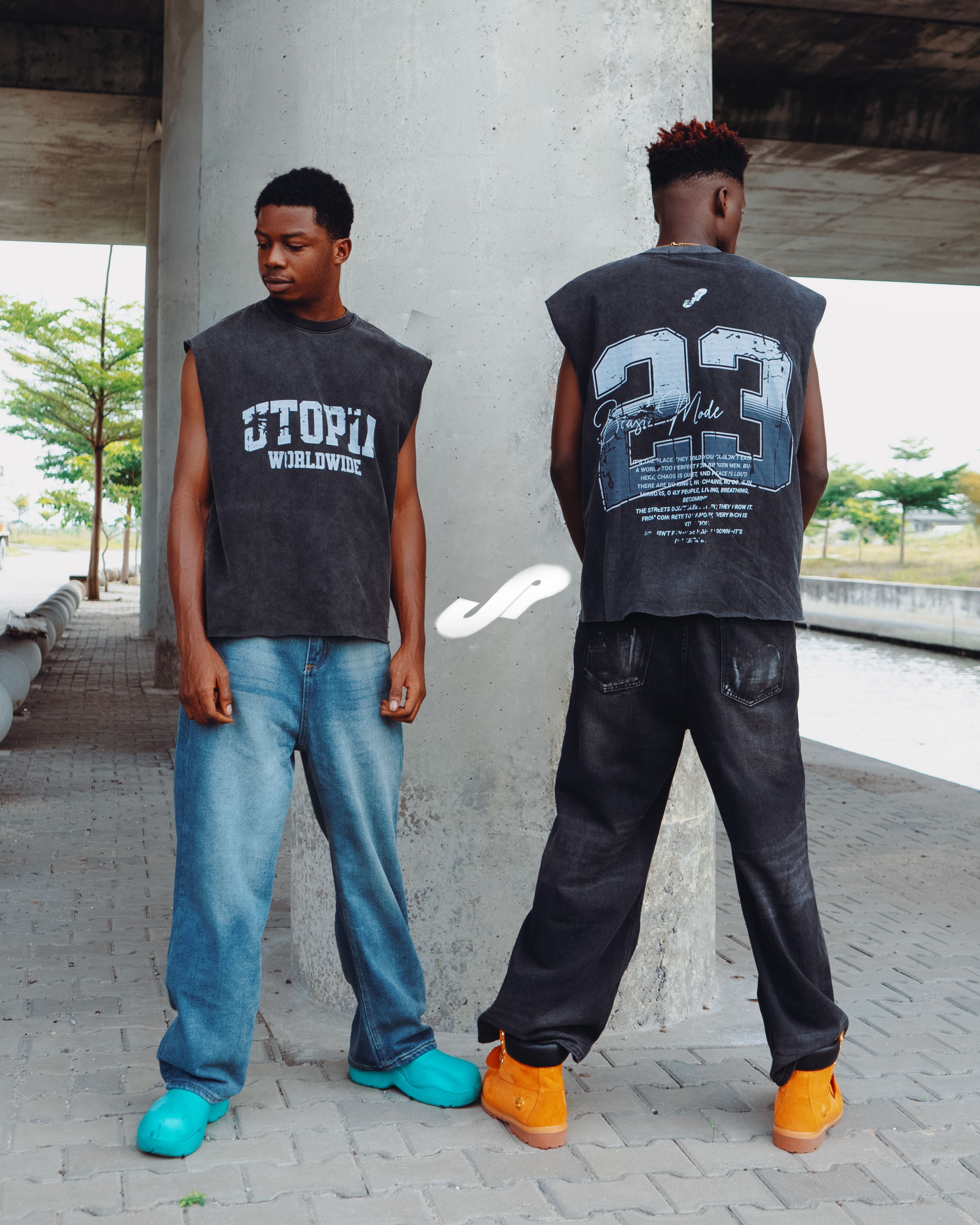 Two young men wearing bold graphic t-shirts — streetwear fashion 2026
