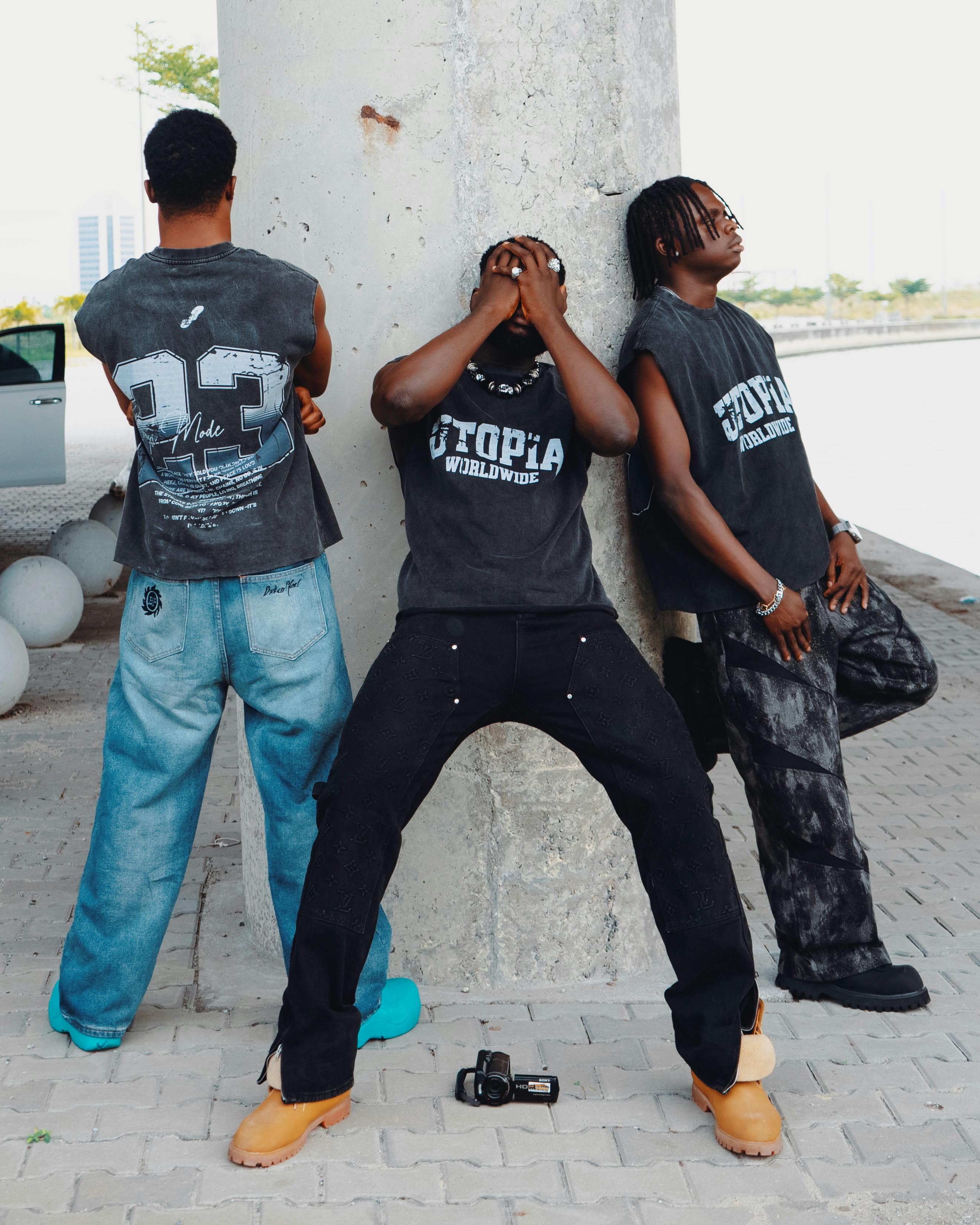 Three men in streetwear outfits — urban style guide 2026