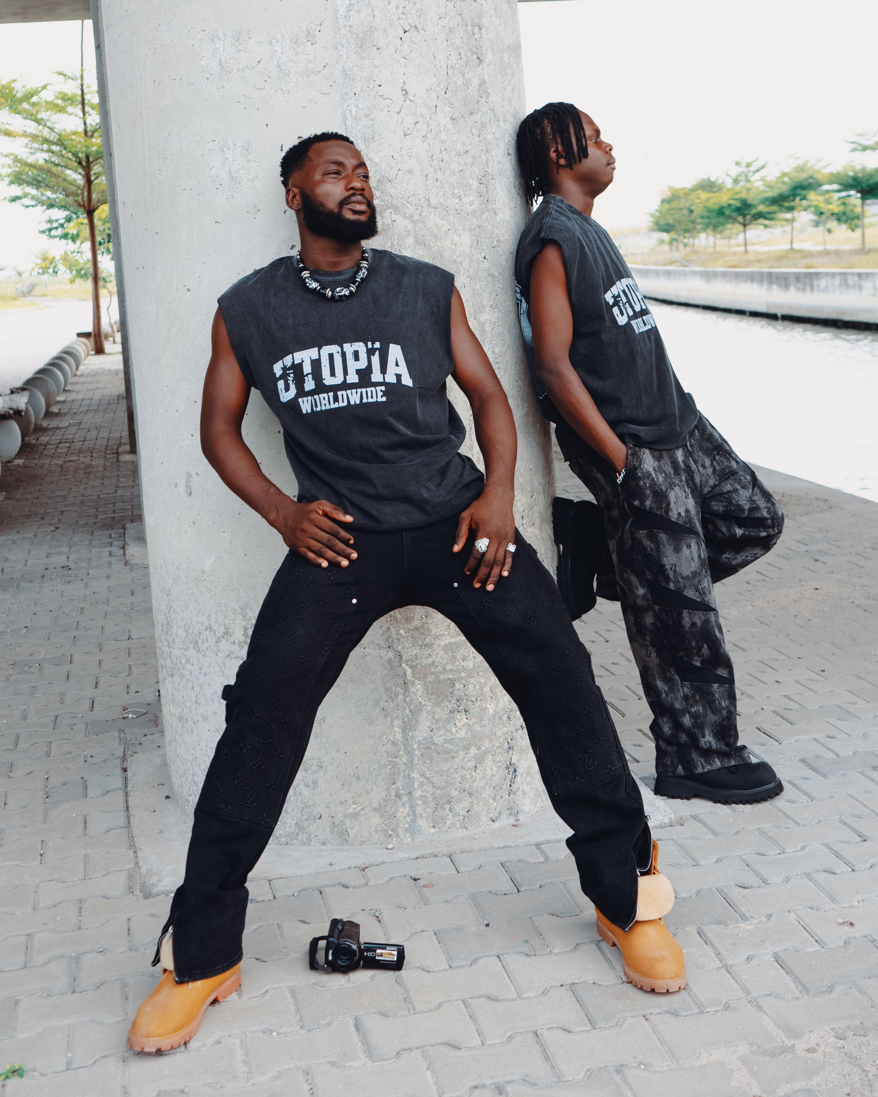 Men in bold streetwear outfits — graphic tee trends 2026