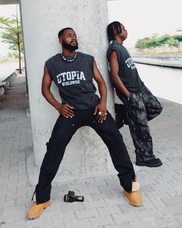 Men in bold streetwear outfits — graphic tee trends 2026