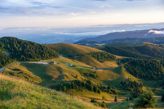 Explore the stunning sunset view over Monte Grappa's rolling hills in Veneto, Italy, capturing nature's serene beauty.