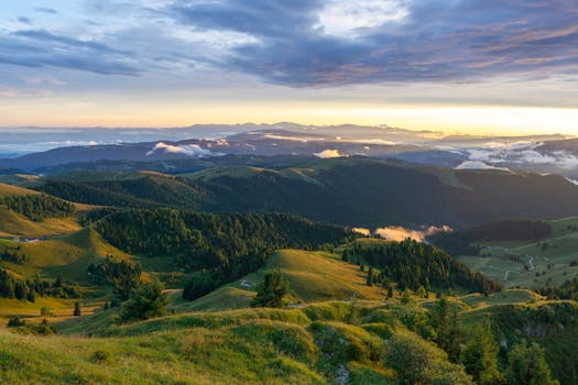 Breathtaking view of Monte Grappa in Veneto, Italy, with lush greenery at sunset.