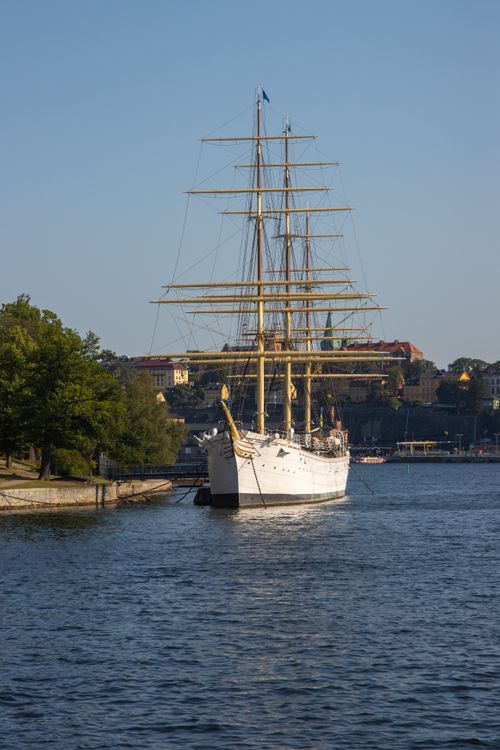 Free A majestic white sailing ship docked in the picturesque harbor of Stockholm, Sweden. Stock Photo