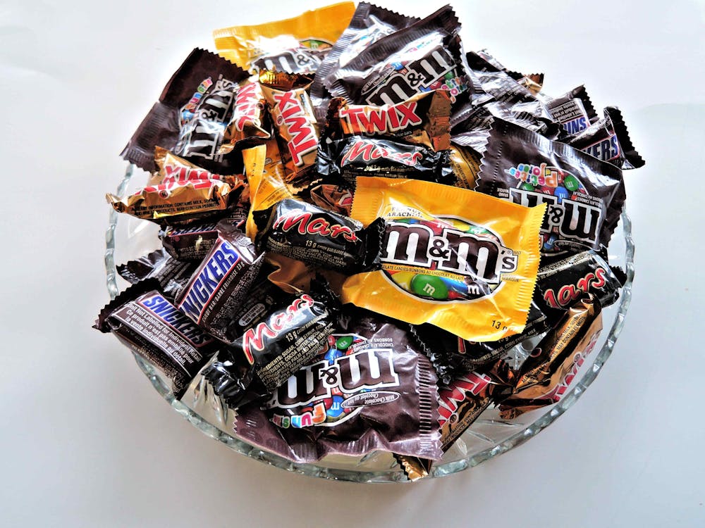 Free M and M on Clear Cut Glass Bowl Stock Photo