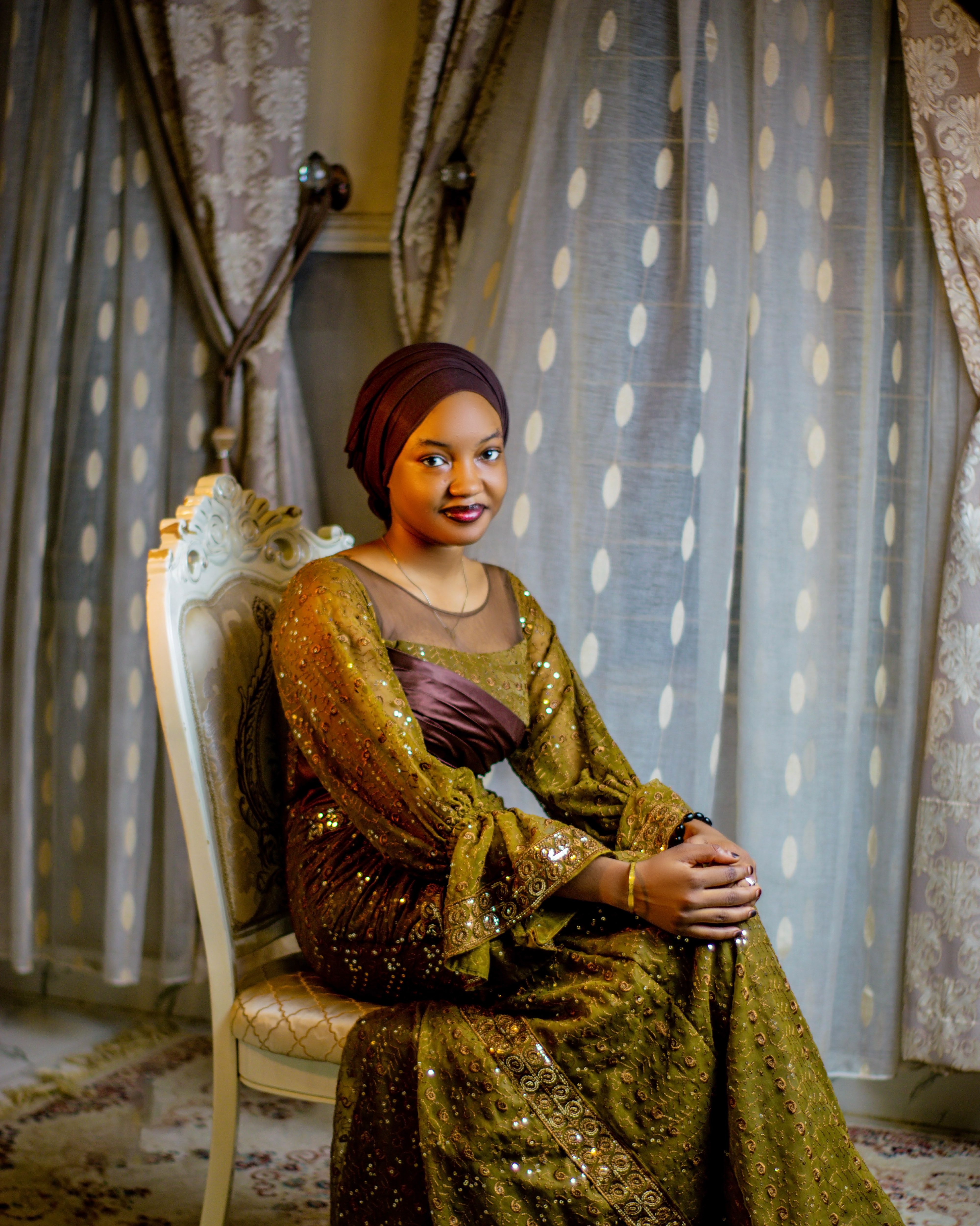 Elegant Woman in Traditional African Dress Indoors · Free Stock Photo