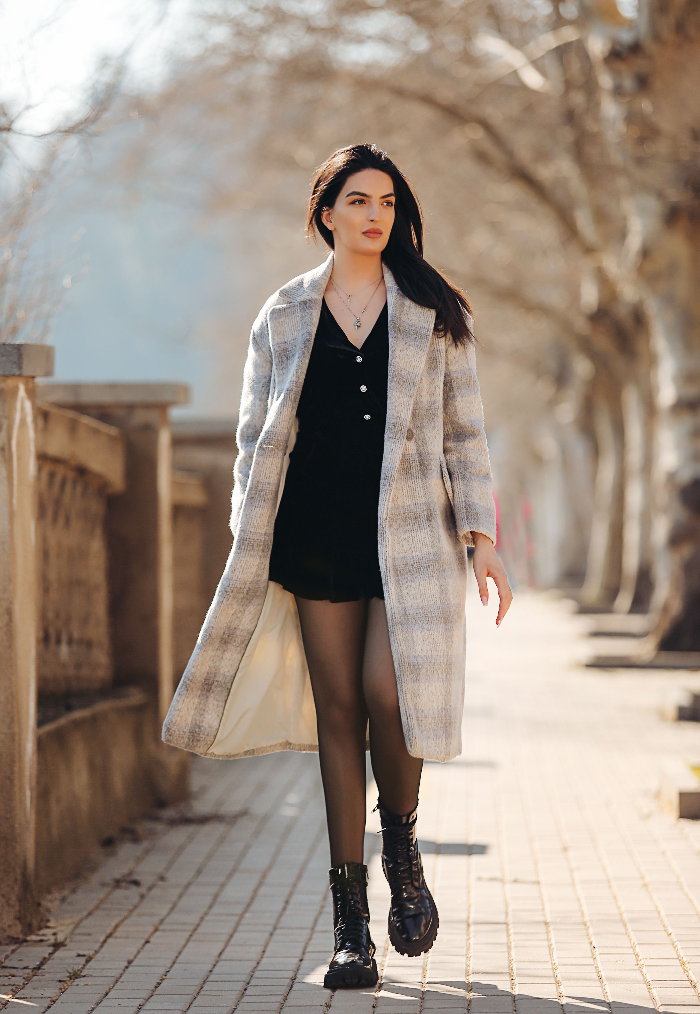 Plaid wool coat with black leggings