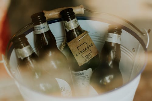 Free Close-Up Photo of Beer Bottles Stock Photo