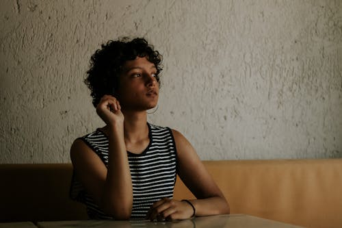 Free Photo Of Woman Leaning On Table Stock Photo