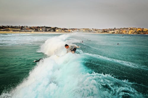 Man Surfing on Sea Waves