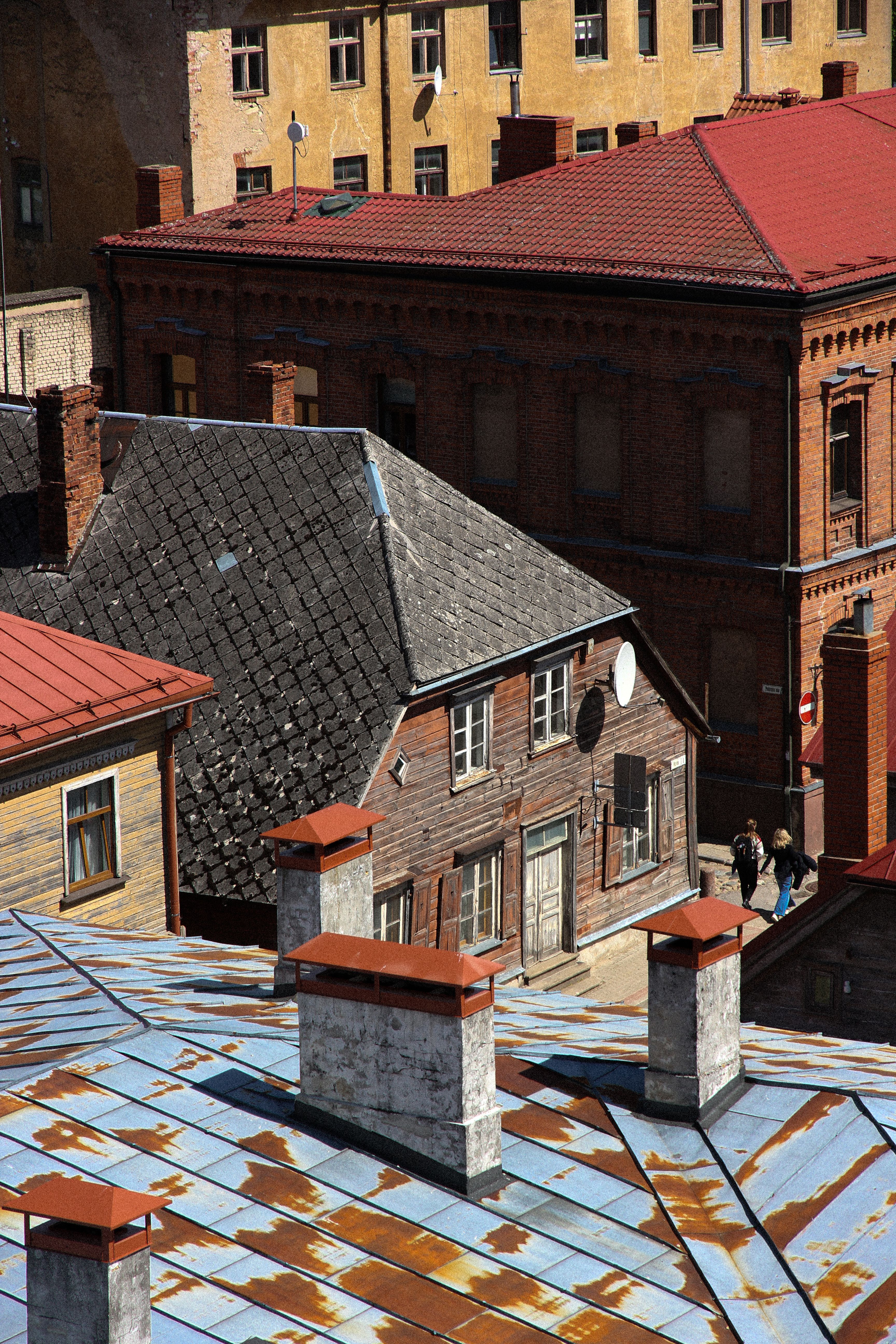 Charming Old Town Rooftops in Sunny Weather · Free Stock Photo