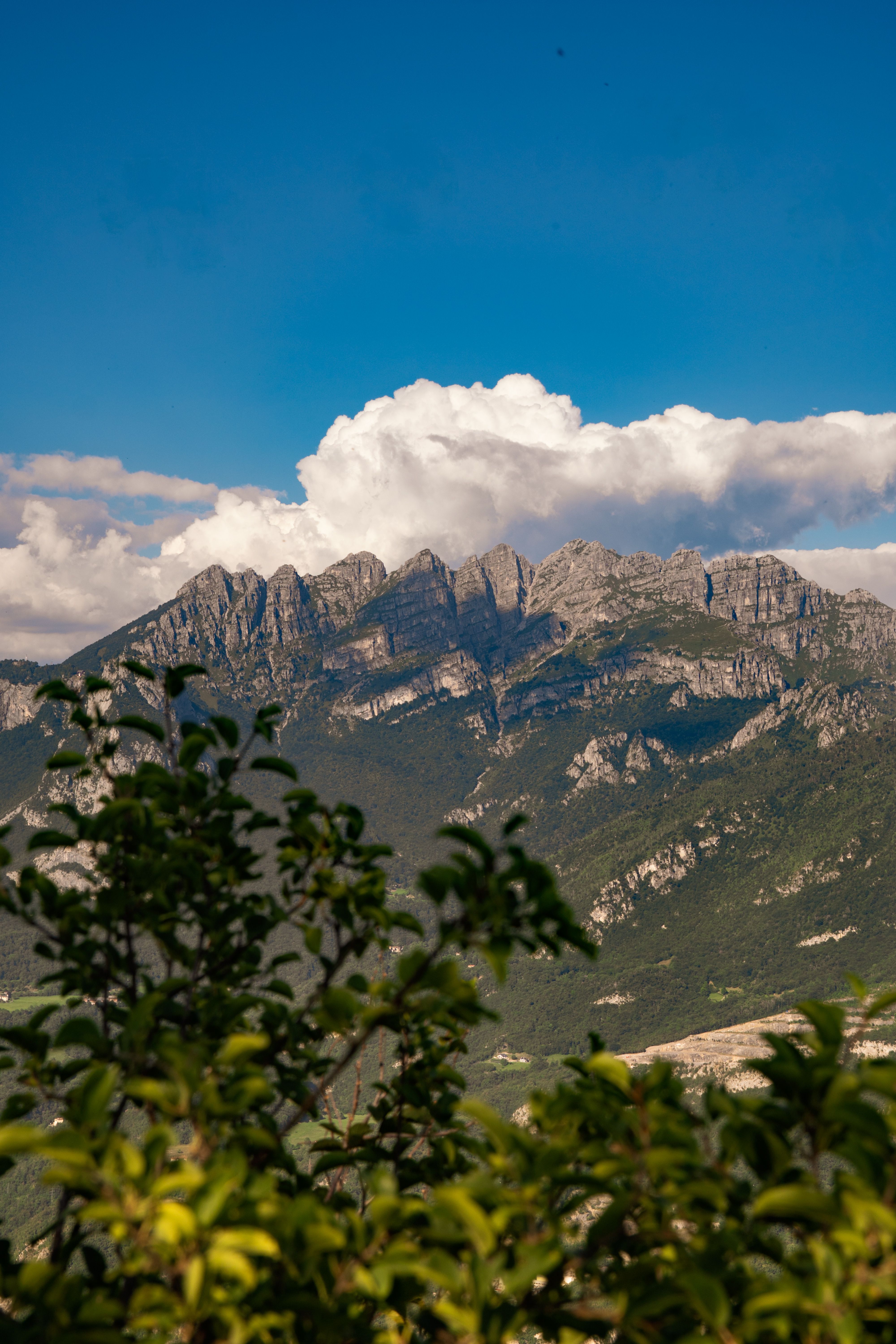 Majestic Mountain Range Under Clear Blue Sky · Free Stock Photo