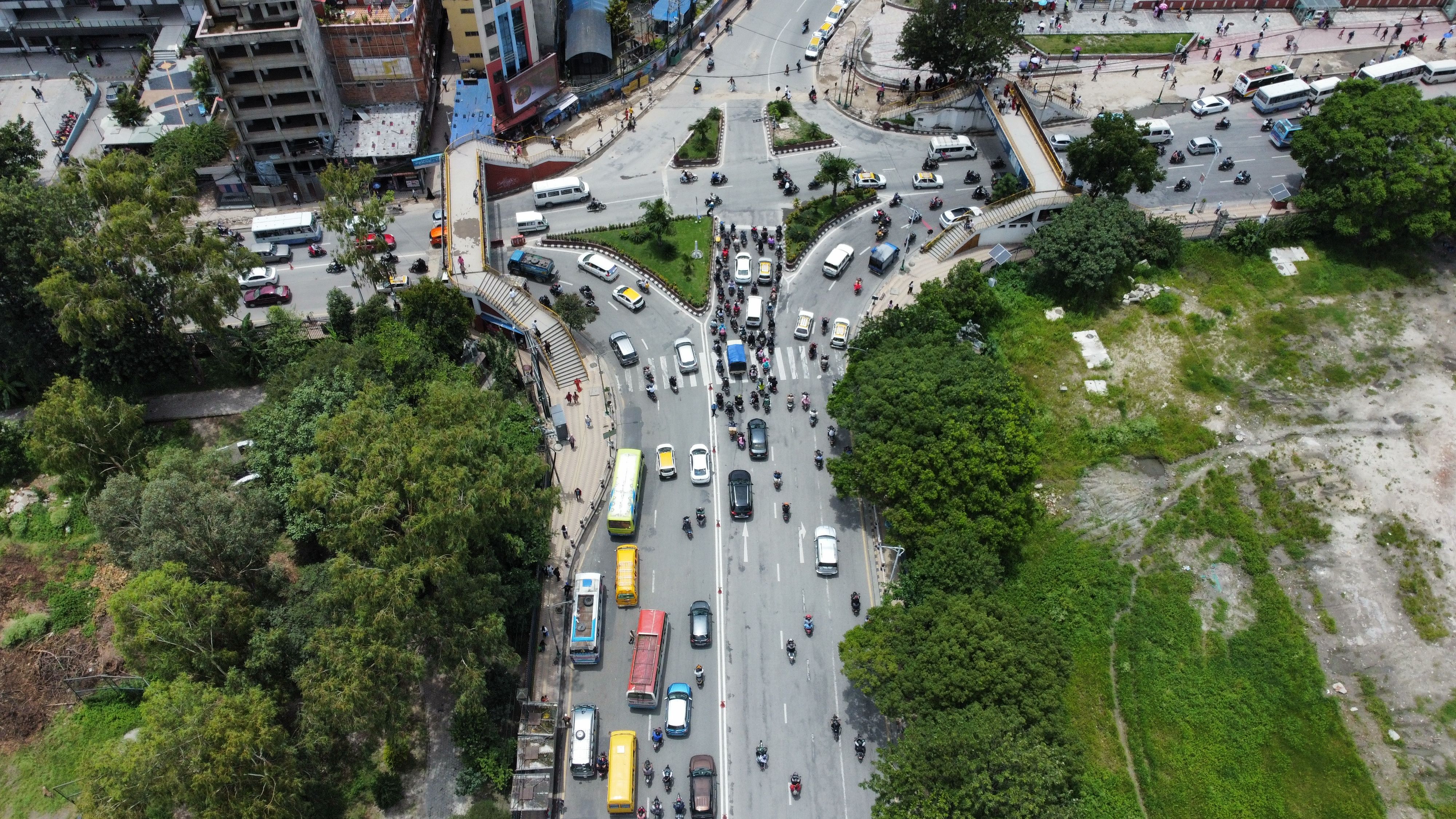 Aerial View of Busy Urban Intersection with Traffic · Free Stock Photo
