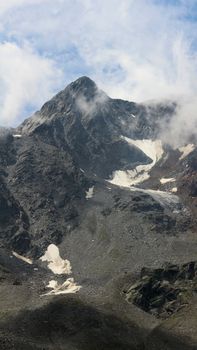 Breathtaking view of rocky mountain peaks and glaciers in Schnalstal, Trentino-Südtirol, Italy.