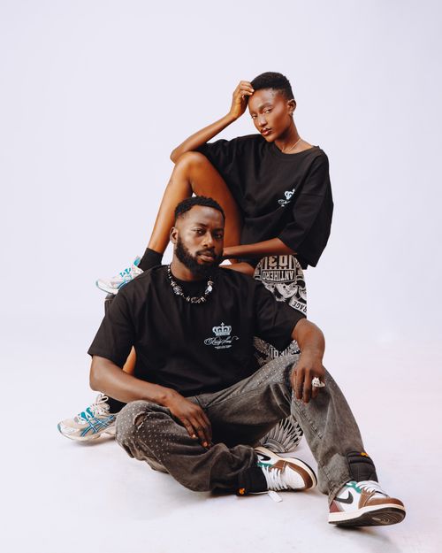 Free Chic urban fashion portrait of young adults in trendy streetwear posing with confident expressions. Stock Photo