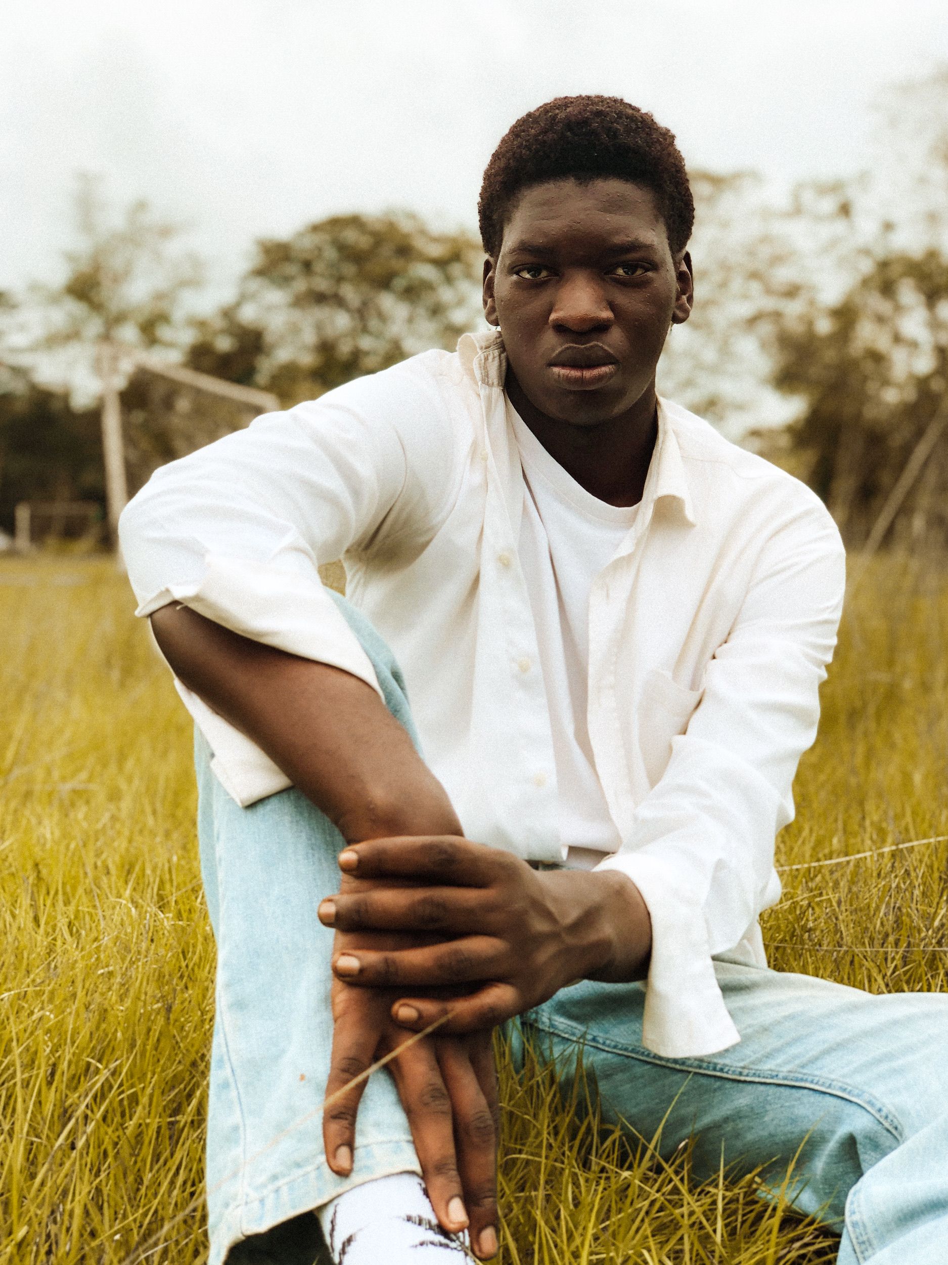 Portrait of a Young Man in a Field · Free Stock Photo