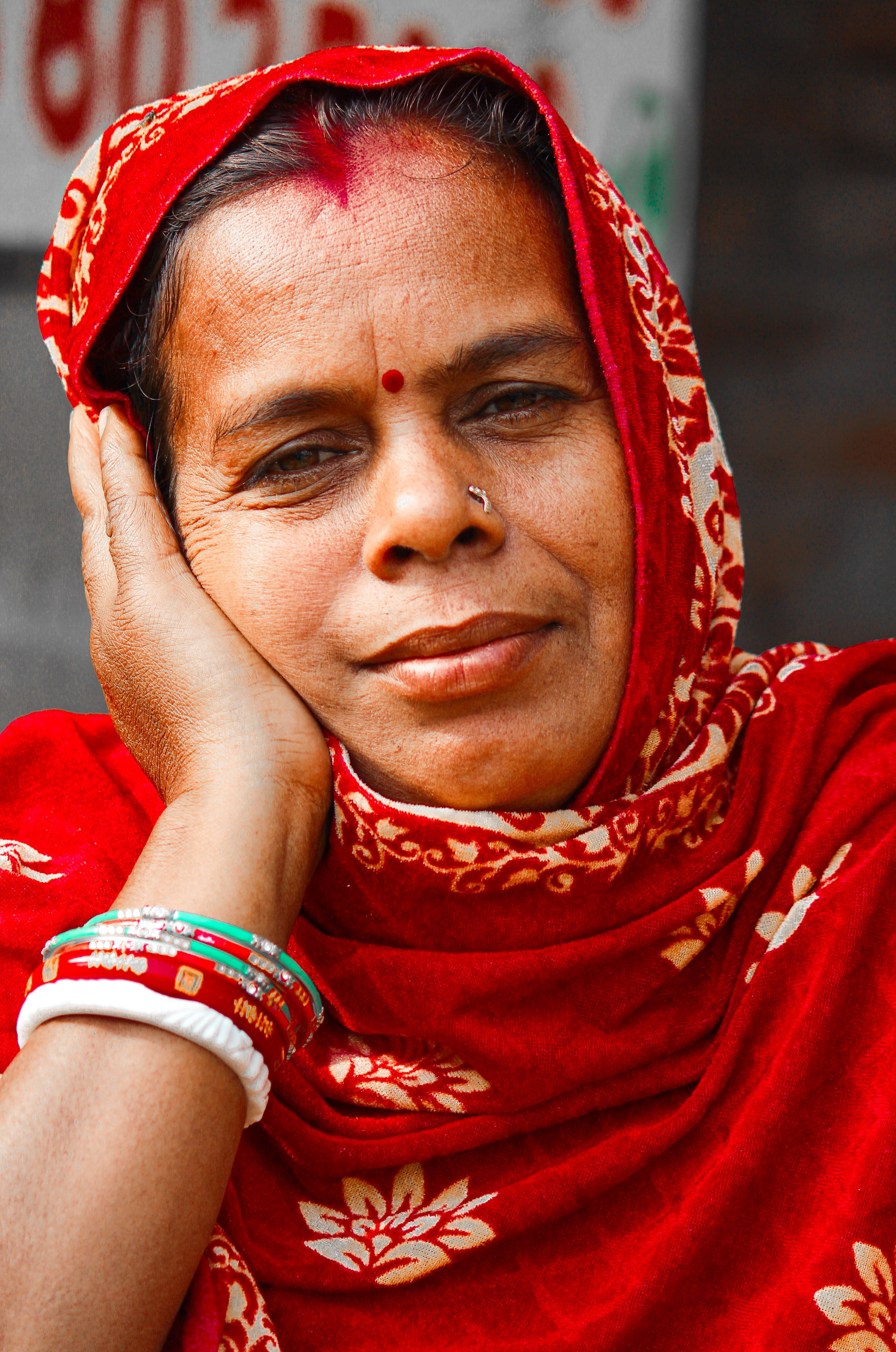 Portrait of a Woman in Red Traditional Attire · Free Stock Photo