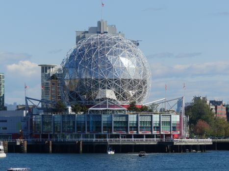 Stunning view of Science World in Vancouver with iconic geodesic dome structure on a sunny day.