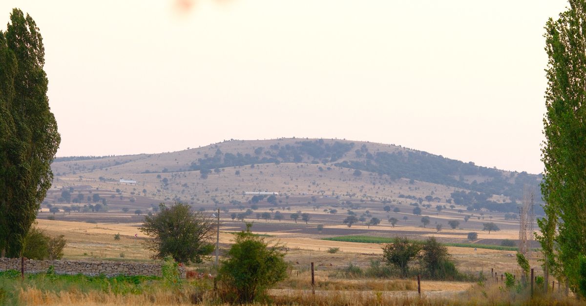 Distant Rural Area Serene Rural Landscape with Distant Hills · Free Stock Photo