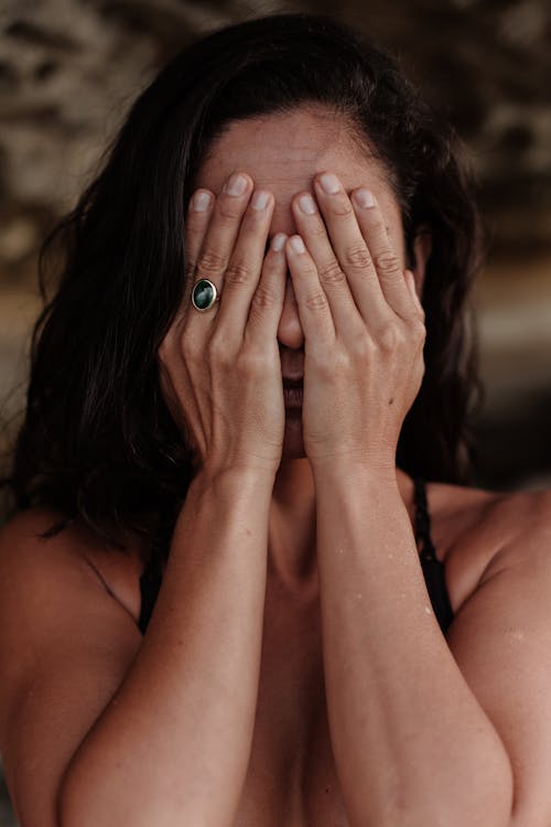 Free Woman Covering her Face Stock Photo