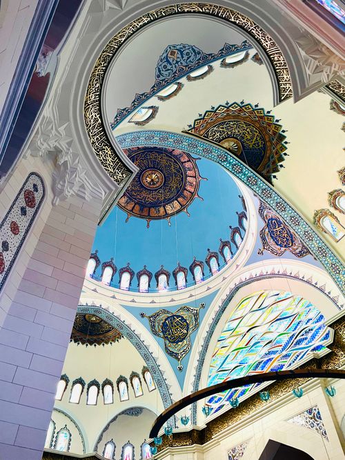 Free Beautiful interior shot of a mosque's ornate dome showcasing Islamic art and architecture. Stock Photo