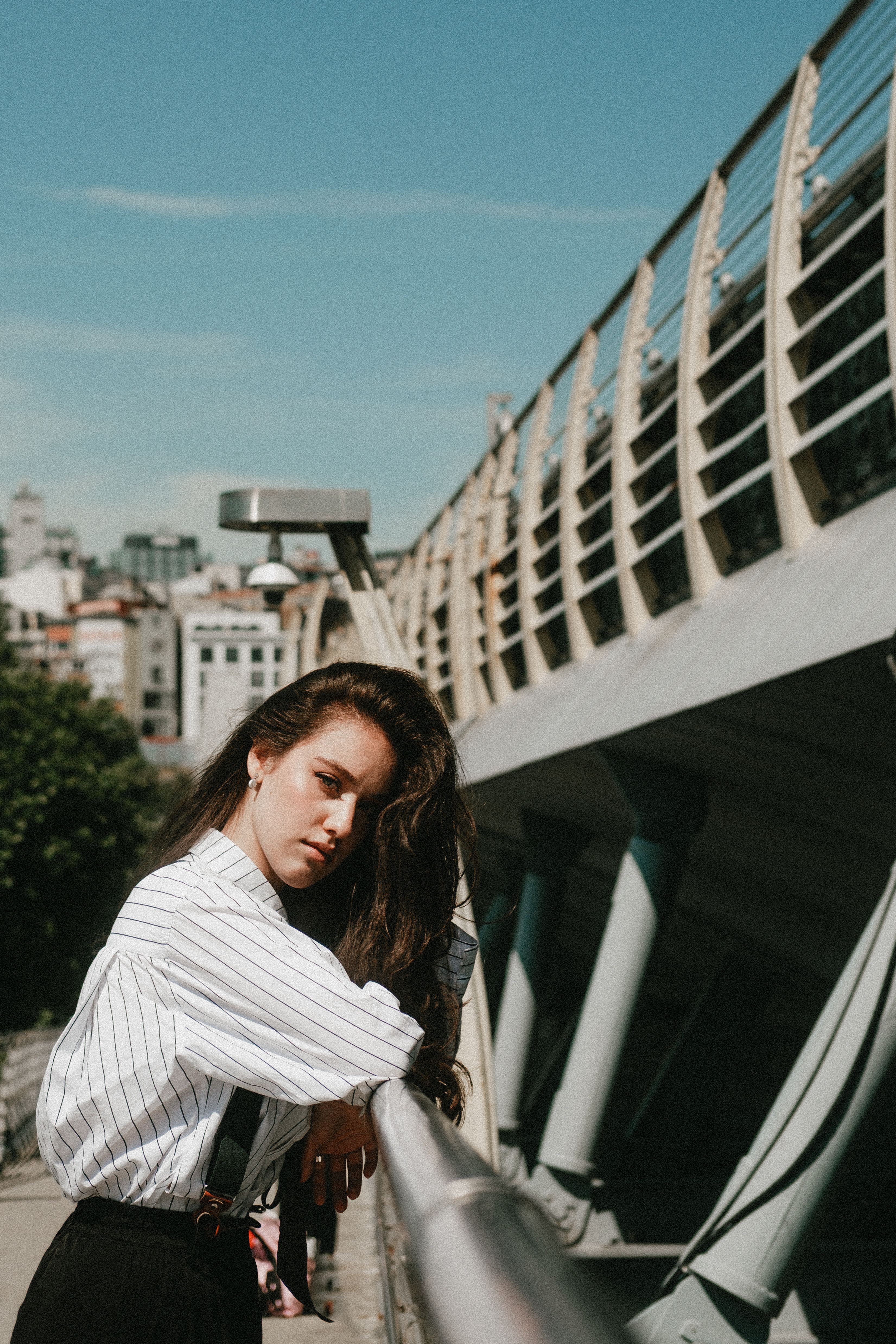 Portrait of a Woman with Her Hand on Her Head · Free Stock Photo