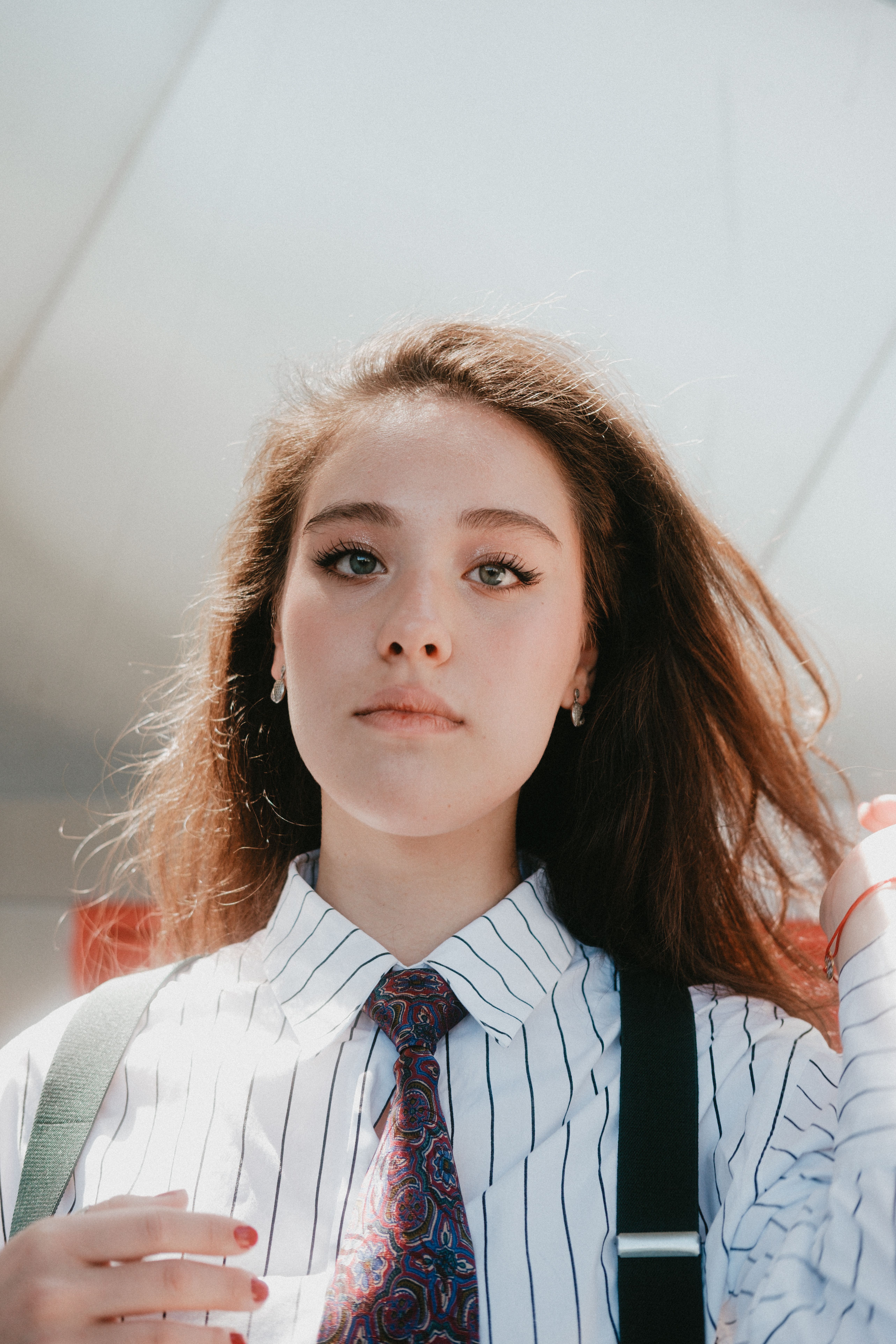 Portrait of a Woman in a White and Black Shirt · Free Stock Photo