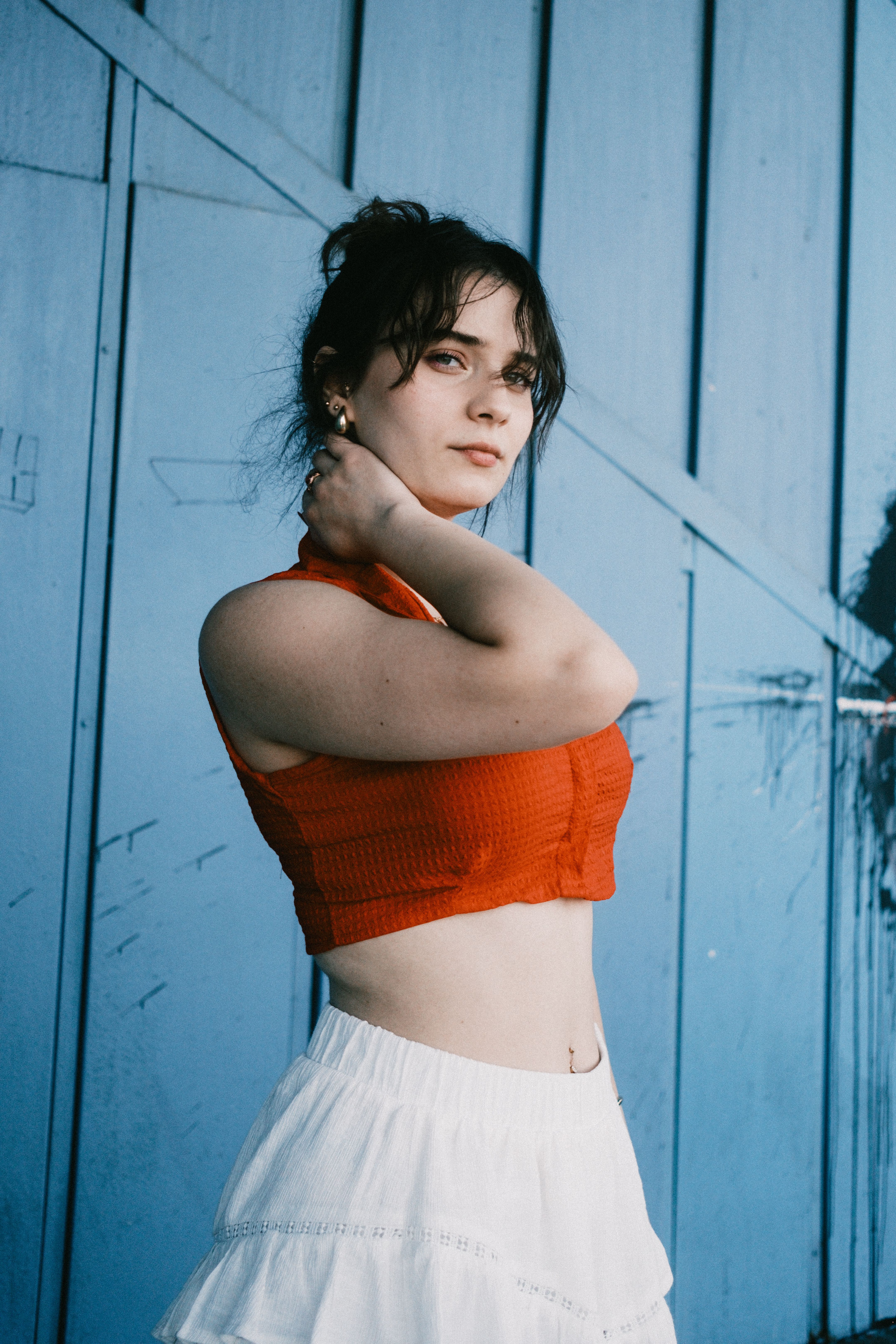 Portrait of Woman in Red Top and White Skirt · Free Stock Photo