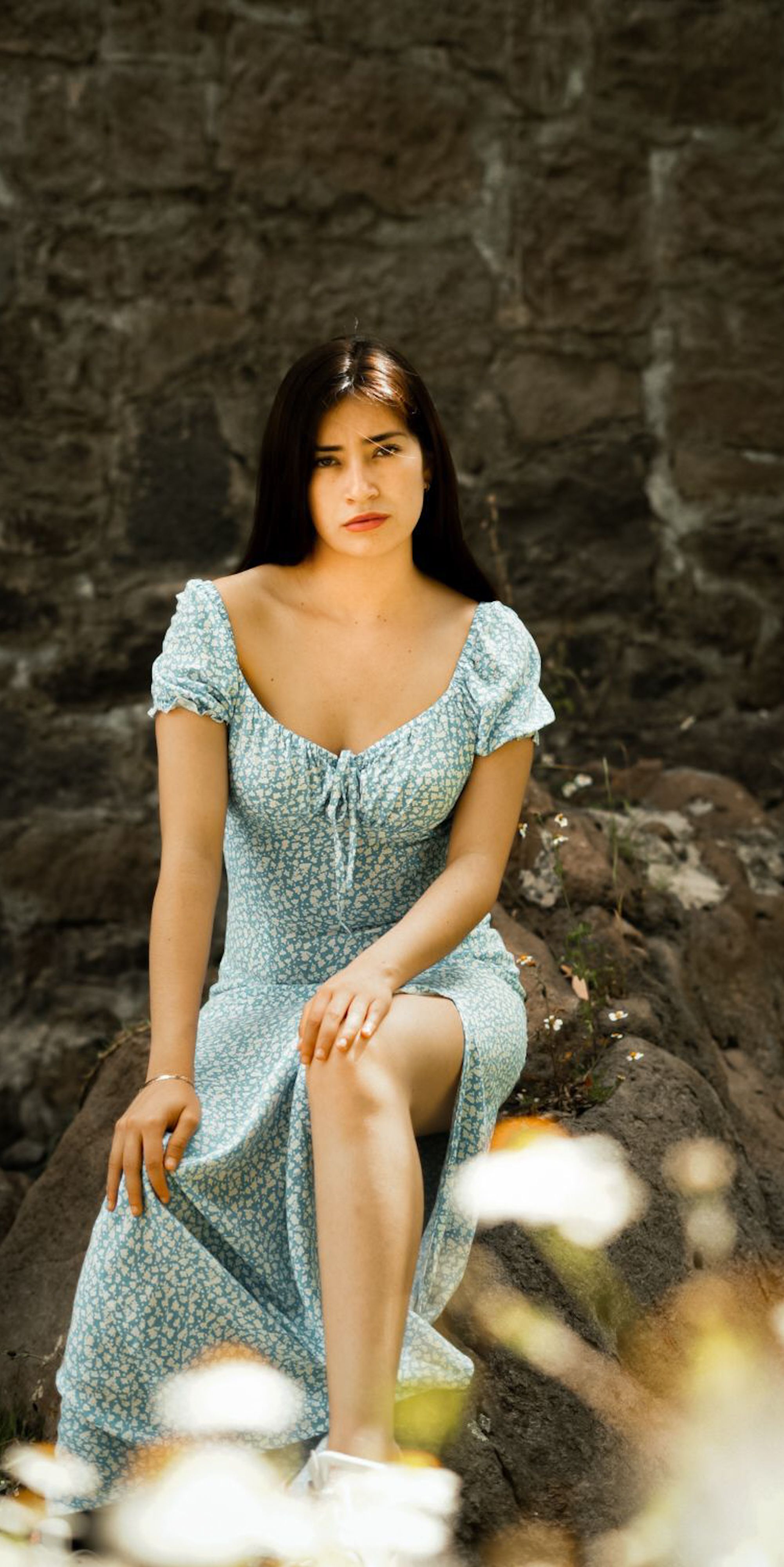 Young Woman in Floral Dress Outdoors · Free Stock Photo